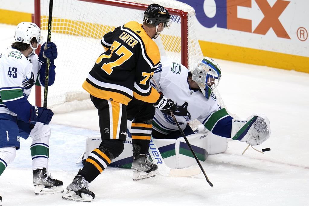 Grâce aux quatre points de Malkin, les Penguins battent les Canucks 5-4