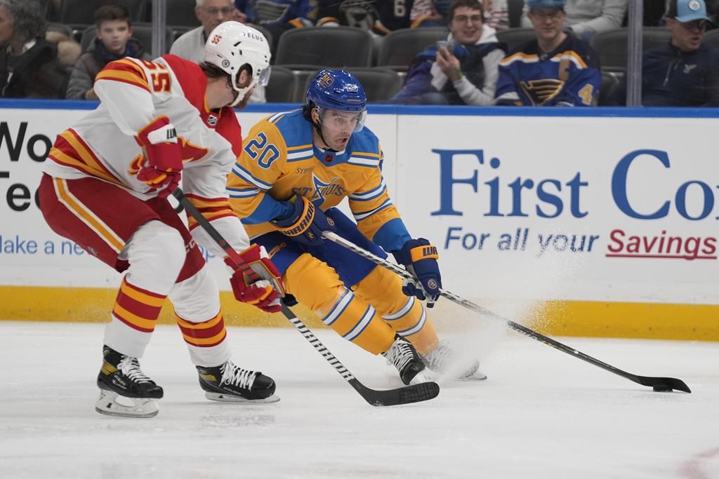 Thomas touche la cible en prolongation et les Blues battent les Flames 4-3